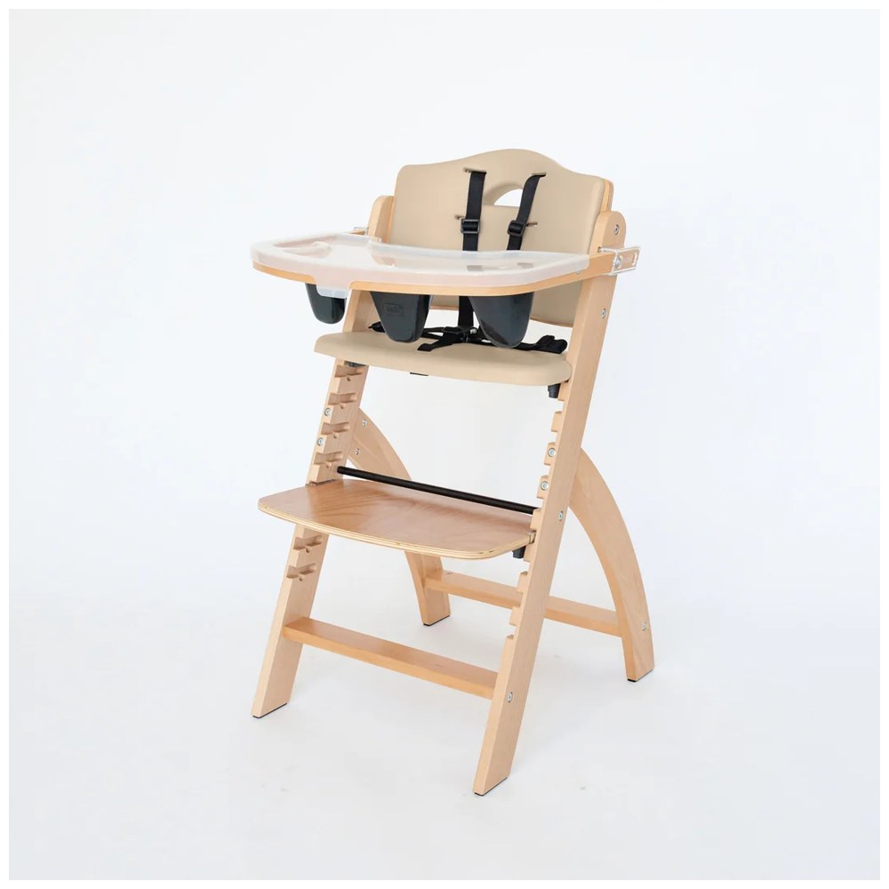 Abiie Beyond Junior Y wooden high chair with tray in natural wood with beige cushion