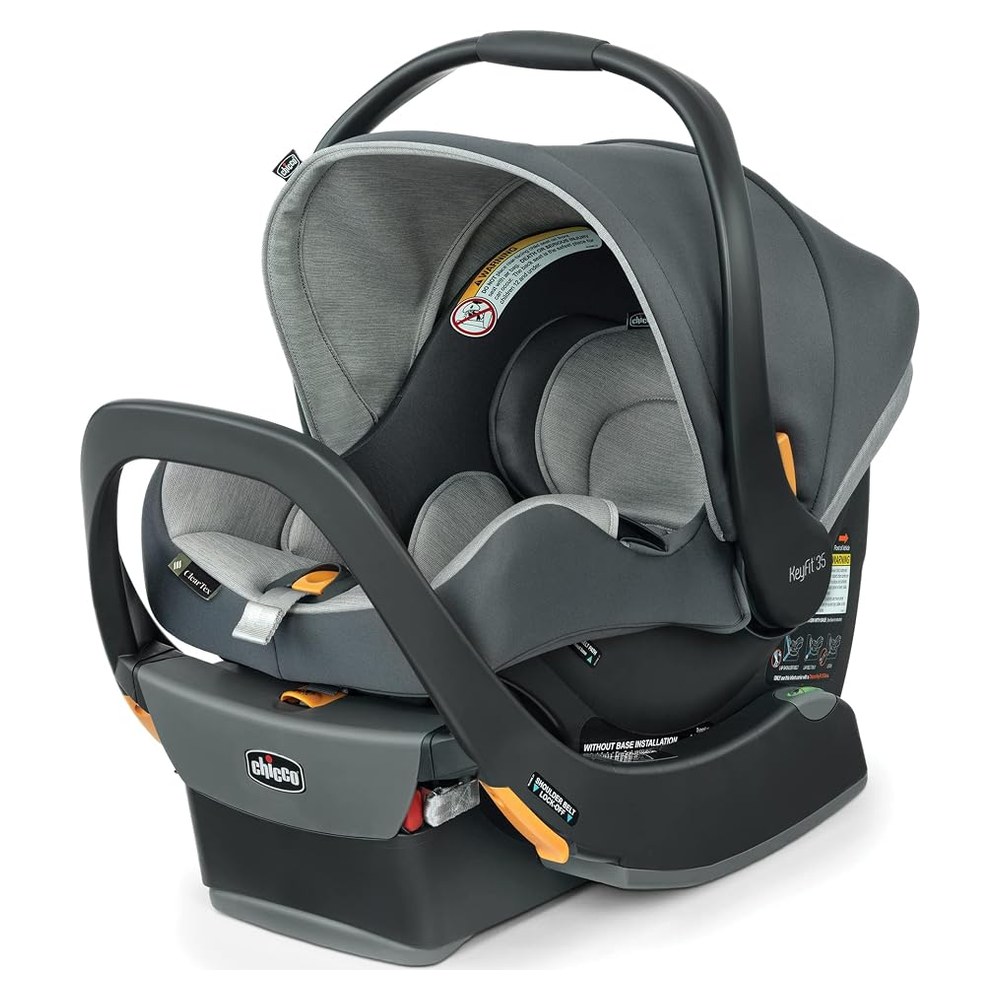 Chicco KeyFit 35 ClearTex infant car seat clicked into its stay-in-car base